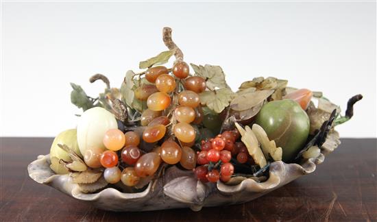 A Chinese soapstone lotus leaf dish, containing hardstone fruits, first half 20th century, dish 38cm